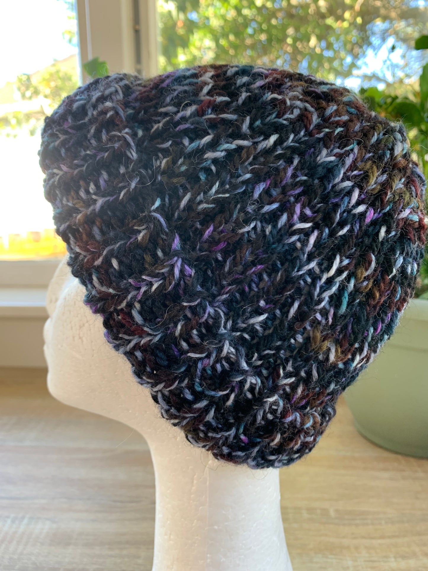 A ‘Born in 2022’ Toddler to Teen knit hat - black/blue/purple marled