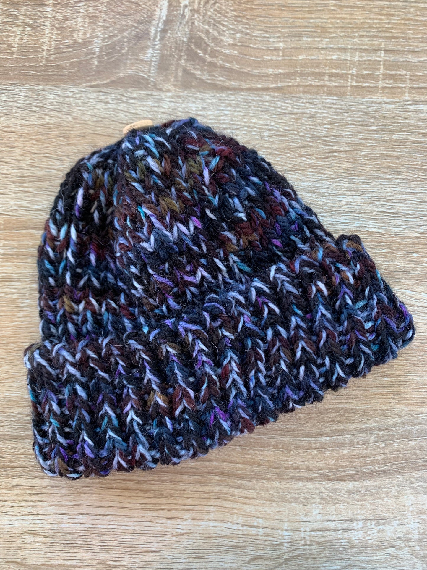 A ‘Born in 2022’ Toddler to Teen knit hat - black/blue/purple marled