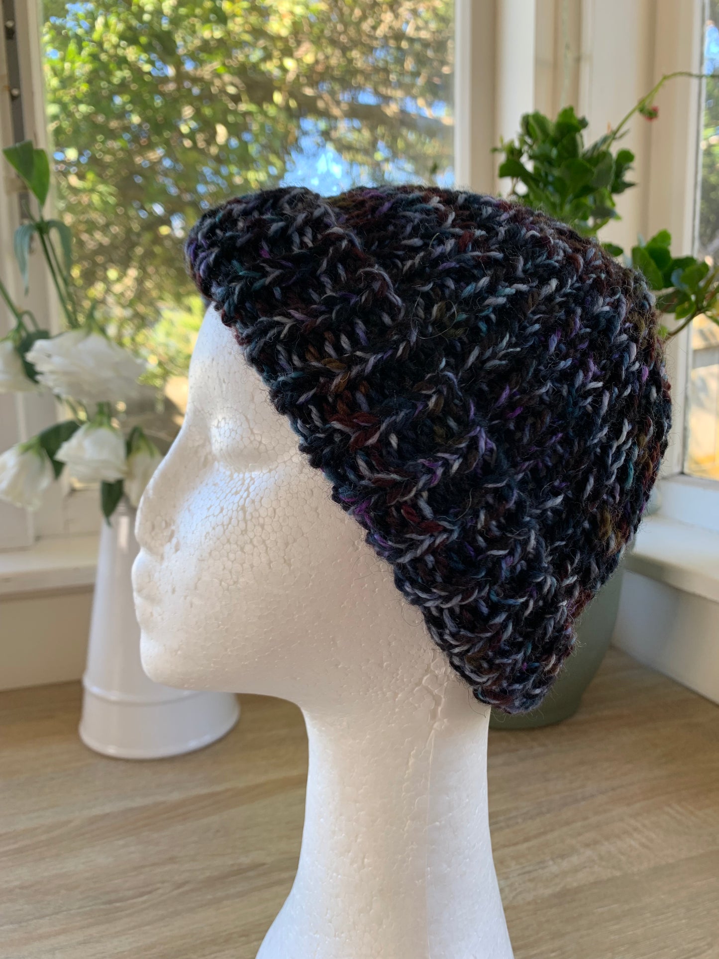 A ‘Born in 2022’ Toddler to Teen knit hat - black/blue/purple marled